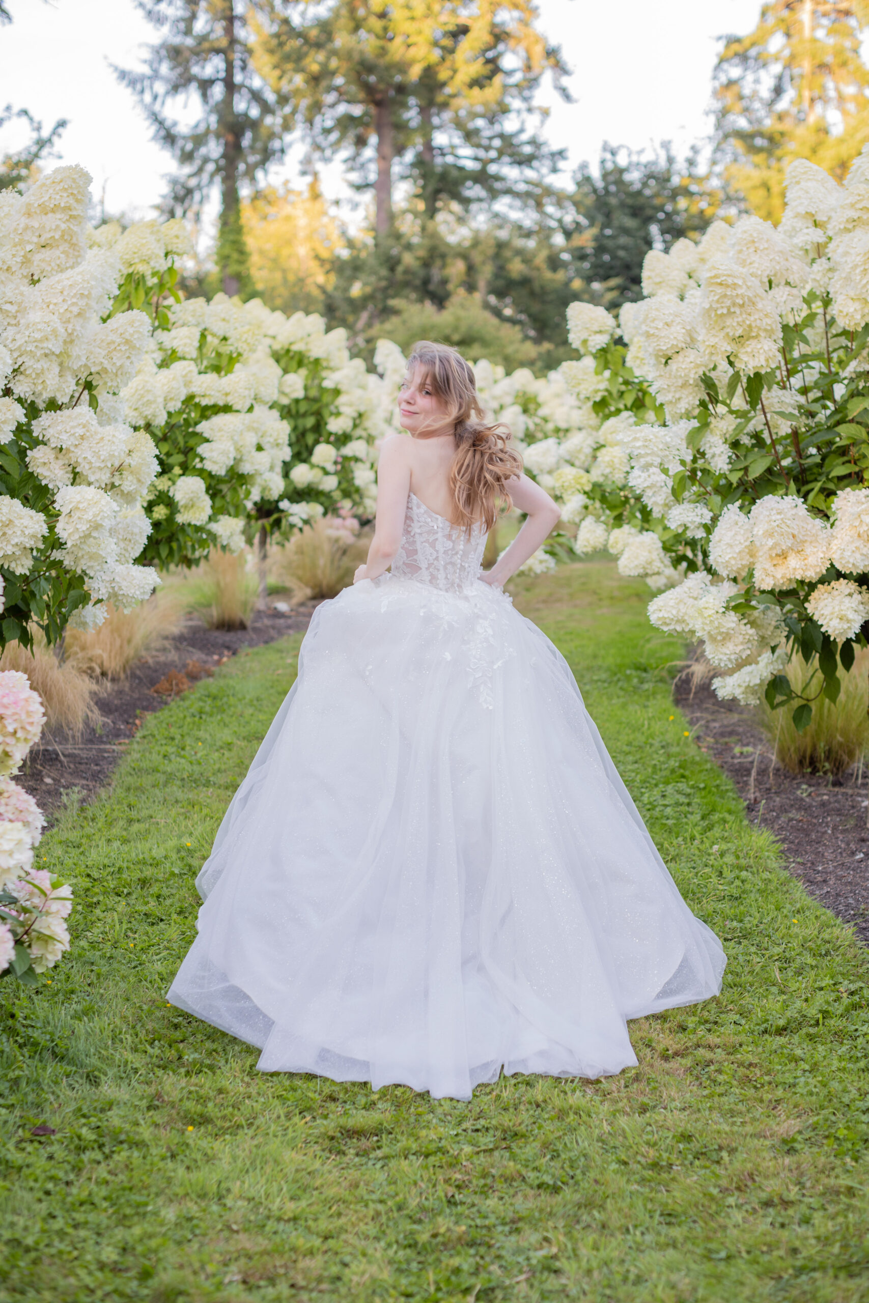 bride-running-surrounded-by-flowers