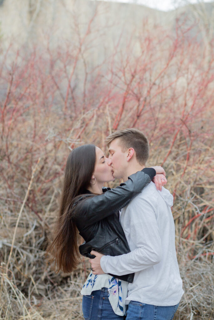 engaged-couple-kissing